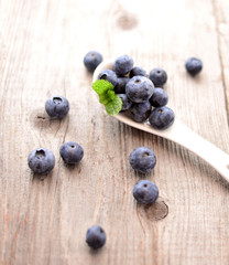 Fresh blueberry on wooden background