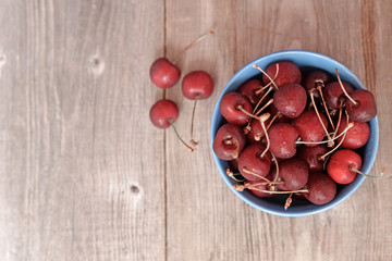 Fresh cherry on wooden table
