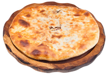 bean filled bread (Lobiani) on wooden plate