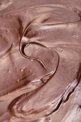 surface of melted dark brown chocolate