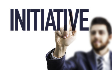 Business man pointing the word: Initiative