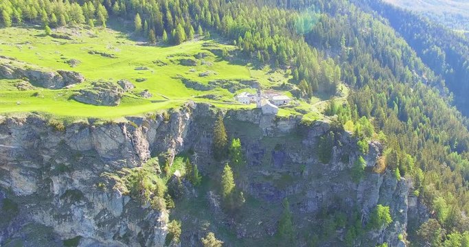 Aerial 4k - Chiesetta di San Romerio (1106) - Valle di Poschiavo - Canton Grigioni - Svizzera 