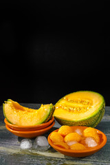 Fresh cantaloupe melon and ice, hot summer concept