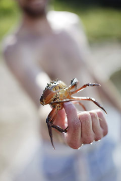 Man holding crab