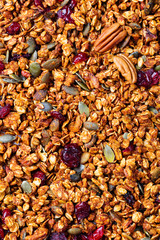 Healthy breakfast. Fresh granola, muesli with pumpkin,pecan nuts,cranberries and maple syrup