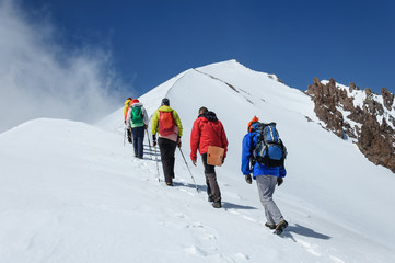 Group climbers goes down from the top of Erciyes volcano.