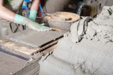 Mixture of clay and lavic sand ready to be modelled to make red bricks
