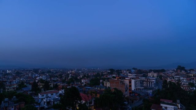 Kathmandu day to night time lapse from Sanepa in Patan, Nepal. Patan in the foreground, Kathmandu in the background