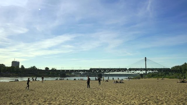 People resting on the city beach in Warsaw.