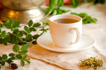 Obraz na płótnie Canvas Treatment herbal tea. Rosehip tea.
