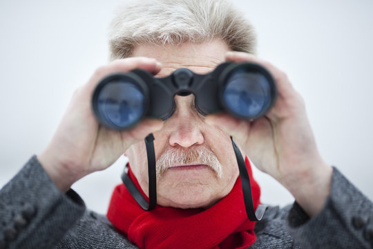 Mature man with Binoculars