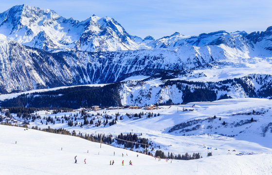View of snow covered Courchevel slope in French Alps