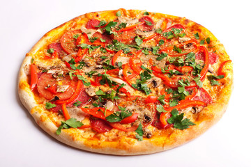 Pizza with salami, tomatoes, paprika and mushrooms isolated on white