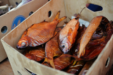 cardboard box with smoked fish