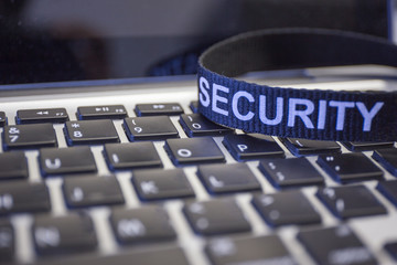 word security on labtop keyboard symbolized computer crime
