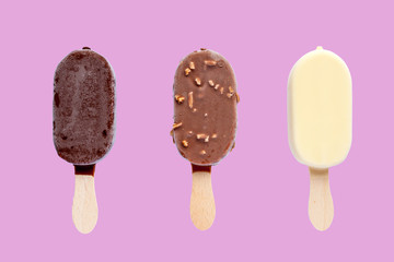 three ice creams on pink background