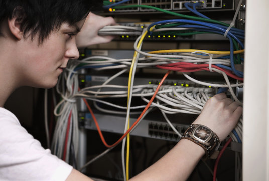 Woman sabotaging in the control room