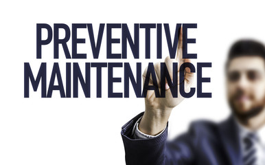 Business man pointing the text: Preventive Maintenance