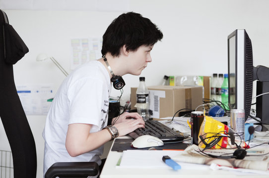 Hacker sitting by the computer