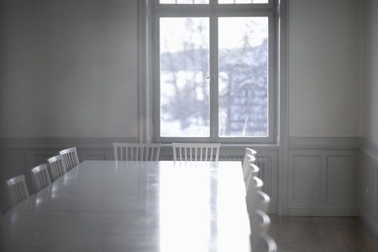 Empty cinference table with sunlight