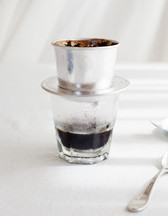 Traditional Vietnamese coffee on white background
