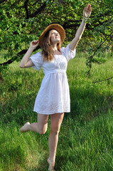 portrait of a teenage   girl in the summer garden