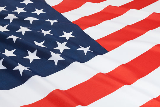 Close up shot of ruffled national flags - United States
