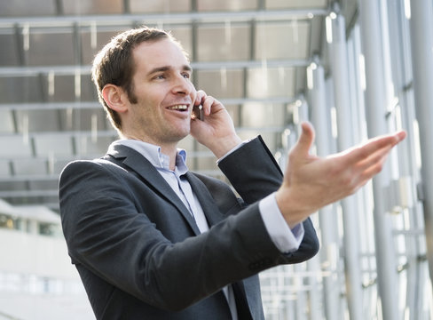 Man talk in phone and gesticulating