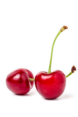 two sweet cherry closeup isolated on white background
