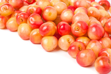 yellow cherries isolated on white background
