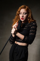 Red-haired diva singing song