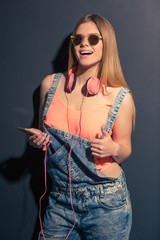 Summer girl with gadget