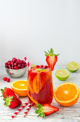 Refreshing summer drink sangria with fruits and berries