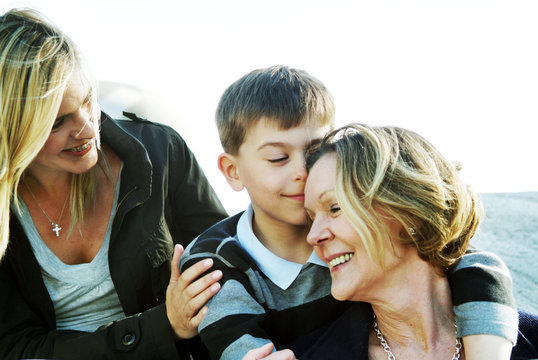 Older woman together with daughter and grandchild