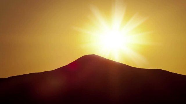 Time lapse Sunrise over the mountain