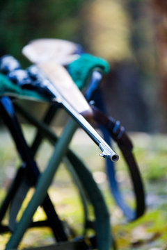 Rifle lying on a chair