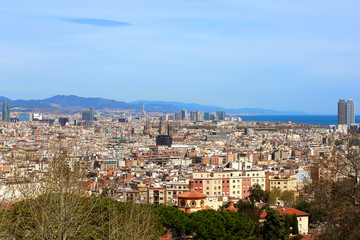 Fototapeta na wymiar Panoramic view from National Art Museum of Catalonia on Barcelona with skyscrapers and the sea