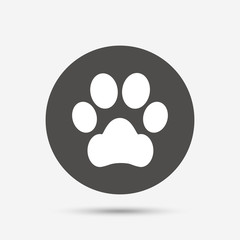 Fototapeta premium Dog paw sign icon. Pets symbol.