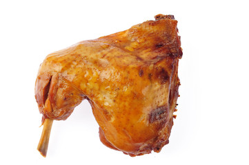 On a white background of the chicken leg