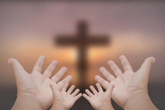 Hands prayer cross