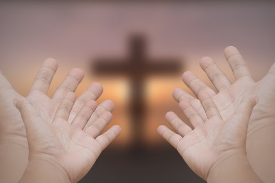 Hands prayer cross
