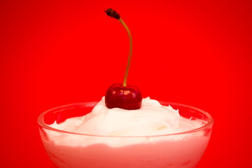 Cherry dessert in a glass cup