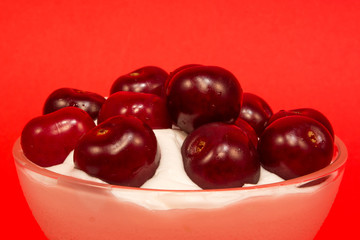 Cherry dessert in a glass cup
