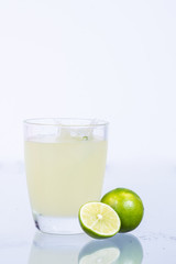 Lemon juice in a glass.Isolated on white.