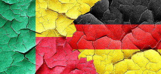 Benin flag with Germany flag on a grunge cracked wall