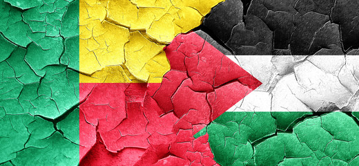 Benin flag with Palestine flag on a grunge cracked wall