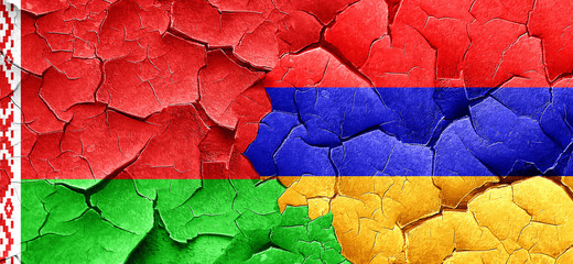 Belarus flag with Armenia flag on a grunge cracked wall