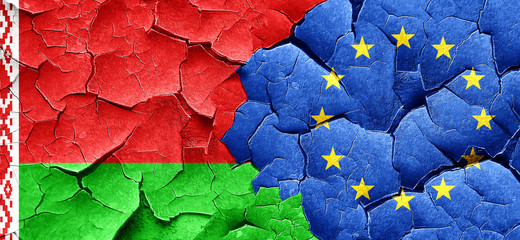 Belarus flag with european union flag on a grunge cracked wall