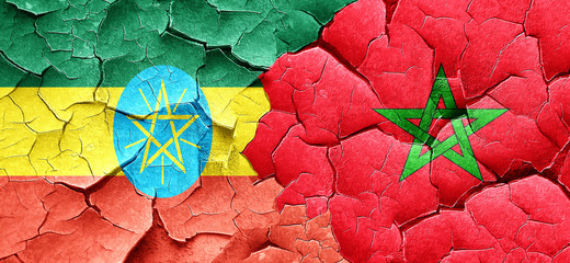 Ethiopia flag with Morocco flag on a grunge cracked wall