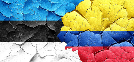 estonia flag with Colombia flag on a grunge cracked wall